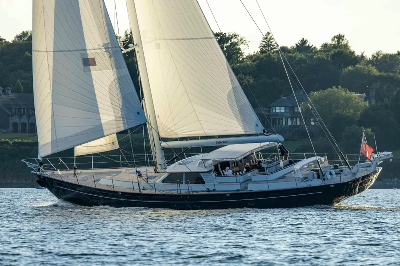 Slide: The Image of 2004 Ta Chiao Custom Pilothouse Cutter sailing on a serene waterway. - 61