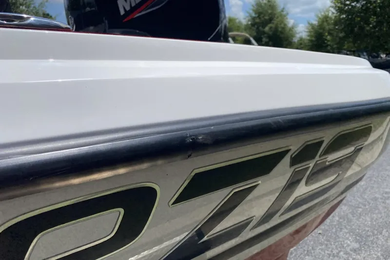 Slide: The Image of 2021 Nitro Z19 Sport boat close-up, showcasing sleek design and branding details. - 4