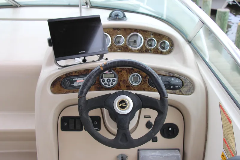 Slide: The Image of Steering console of a 2002 Sea Ray Sundancer 260 with Garmin navigation system. - 7