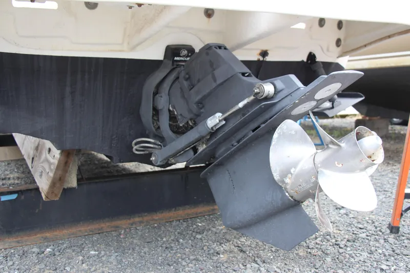 Slide: The Image of Close-up of a 2002 Sea Ray Sundancer 260 boat propeller and outdrive. - 13