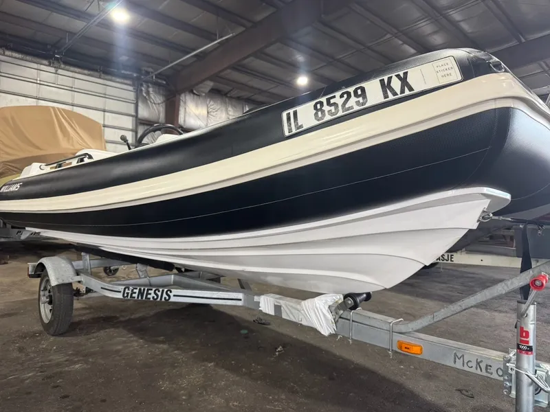 Slide: The Image of A 2019 Williams Jet Tenders 395 Sport Jet on a trailer in a warehouse. - 4