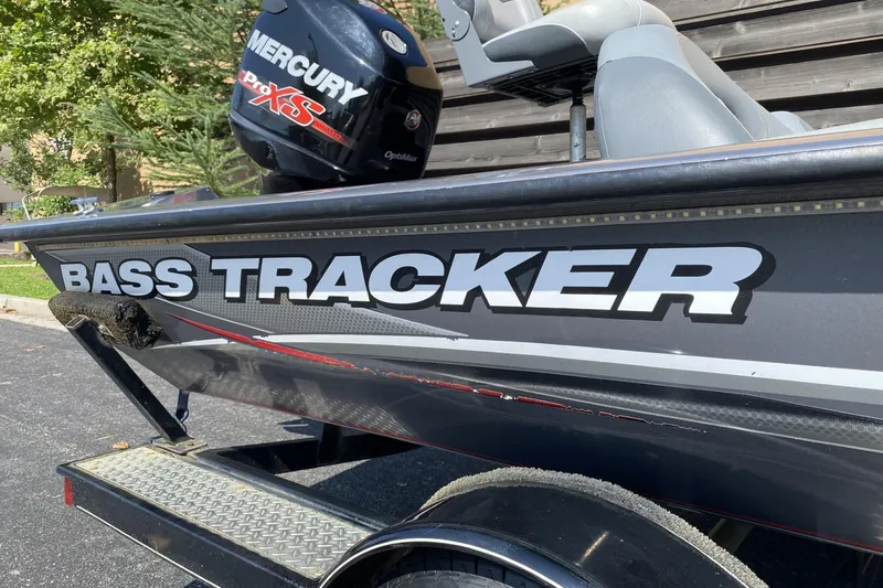 Slide: The Image of 2014 Tracker Pro Team 190 TX bass boat with Mercury Pro XS engine. - 5