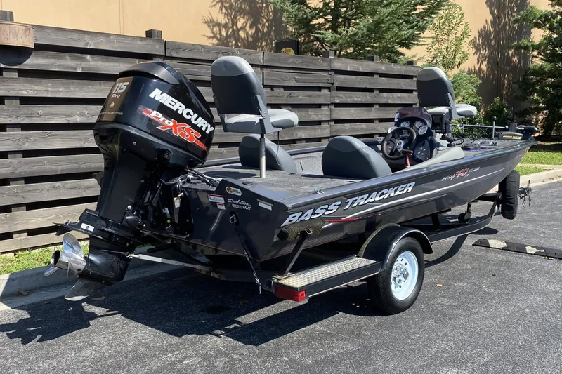 Slide: The Image of 2014 Tracker Pro Team 190 TX bass boat with Mercury 115 Pro XS engine. - 7