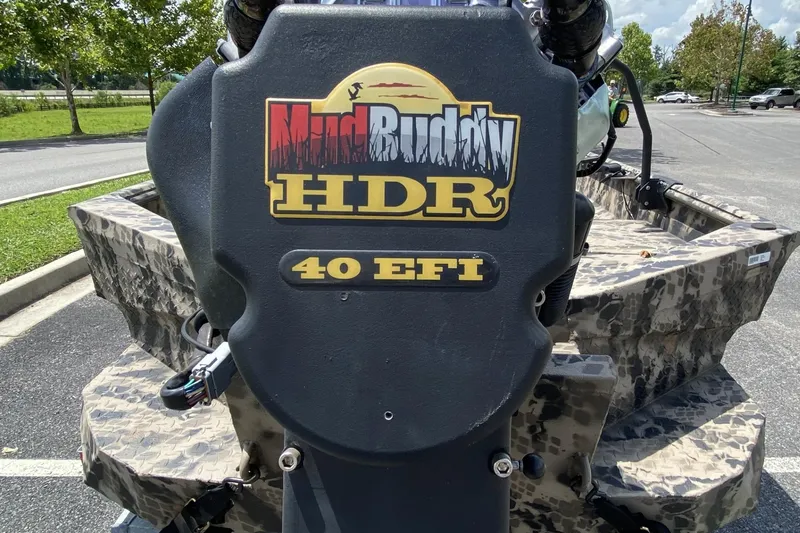 Slide: The Image of 2022 Havoc 1860 DBST boat with Mud Buddy HDR 40 EFI engine in a parking lot. - 6