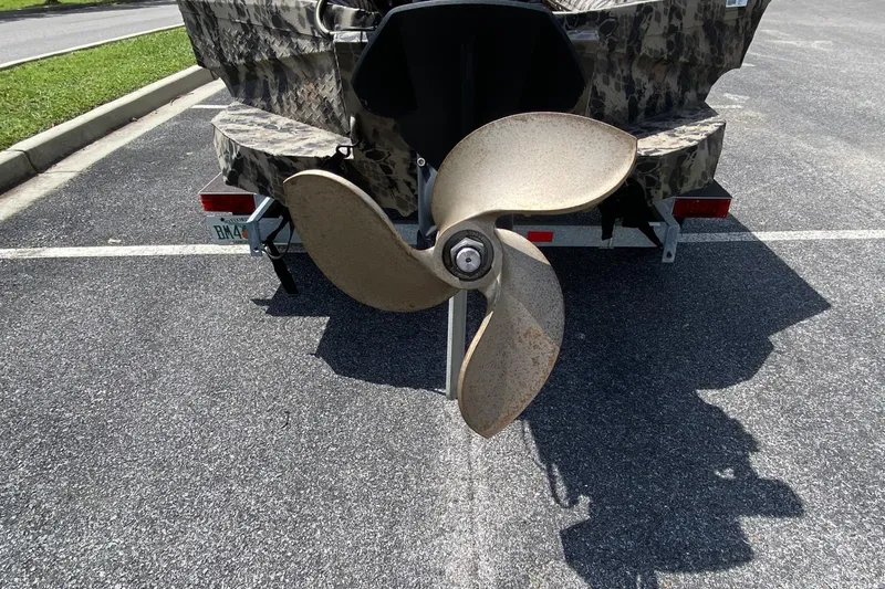 Slide: The Image of Propeller of 2022 Havoc 1860 DBST boat on a trailer in parking lot. - 7