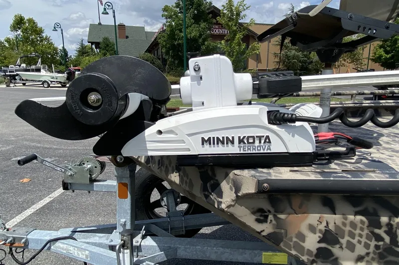 Slide: The Image of Minn Kota Terrova motor on 2022 Havoc 1860 DBST boat trailer in parking lot. - 5
