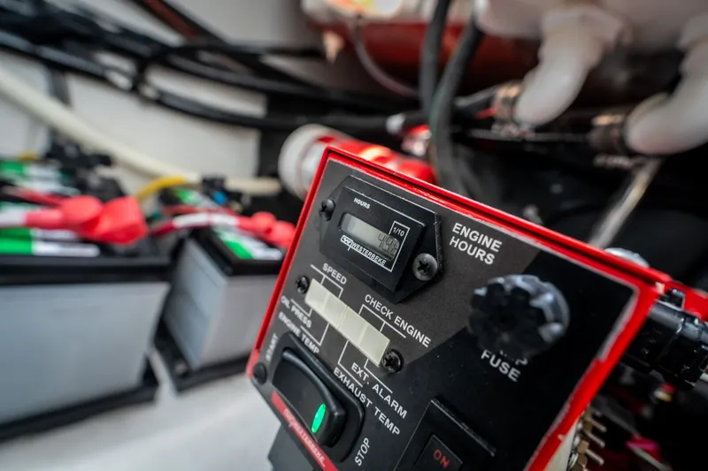 Slide: The Image of Close-up of 2023 Monterey 378SS Super Sport engine control panel with battery connections. - 42
