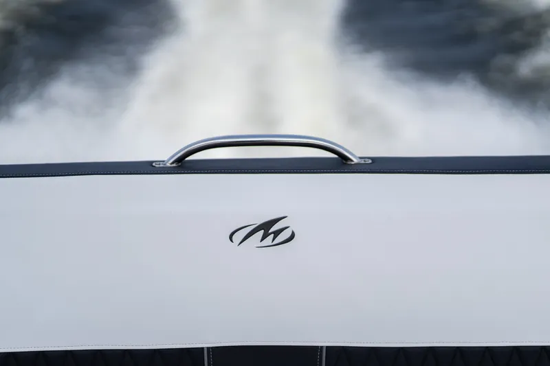 Slide: The Image of 2023 Monterey 378SS Super Sport boat detail with logo and water backdrop. - 44