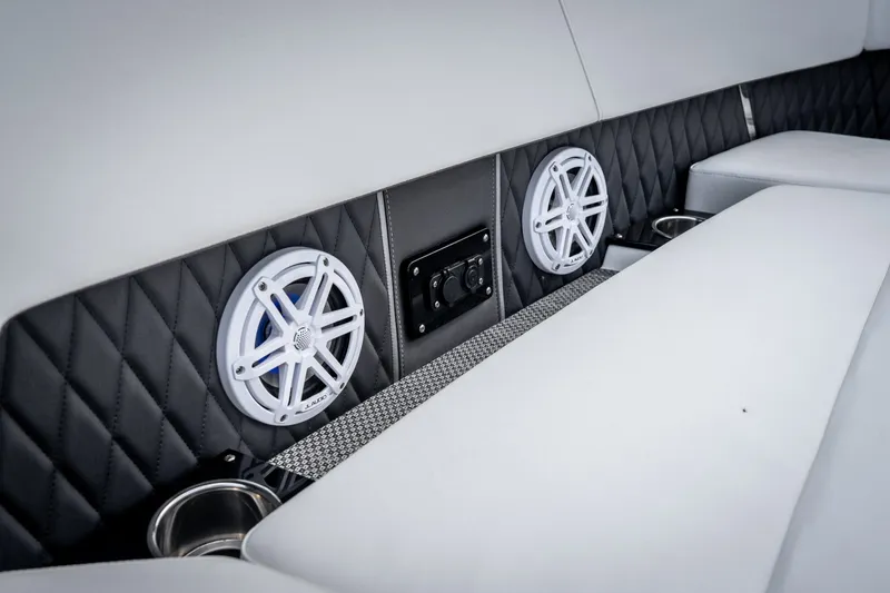 Slide: The Image of Luxurious interior of 2023 Monterey 378SS Super Sport boat with speakers and quilted upholstery. - 24
