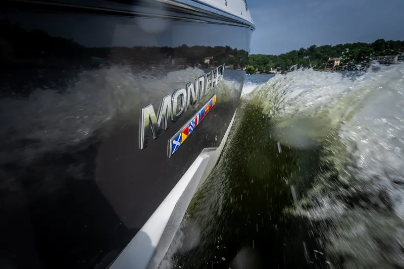 Slide: The Image of 2023 Monterey 378SS Super Sport boat cutting through water, showcasing sleek design. - 7