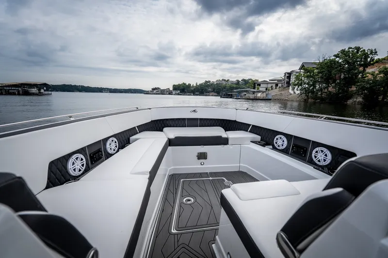 Slide: The Image of Luxurious interior of 2023 Monterey 378SS Super Sport boat on a serene lake. - 22