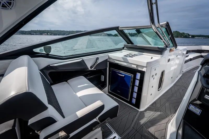 Slide: The Image of 2023 Monterey 378SS Super Sport boat interior with sleek seating and modern amenities. - 19