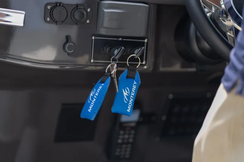 Slide: The Image of Dashboard of 2023 Monterey 378SS Super Sport with keys and blue keychains. - 43