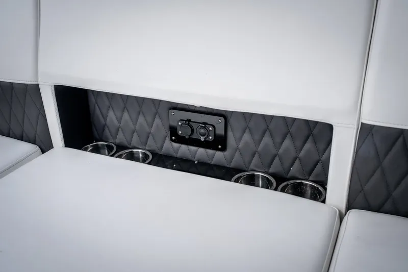 Slide: The Image of Luxury seating with cup holders in 2023 Monterey 378SS Super Sport boat interior. - 36