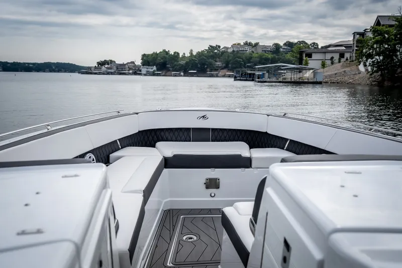 Slide: The Image of 2023 Monterey 378SS Super Sport boat interior with lake view and modern seating. - 29
