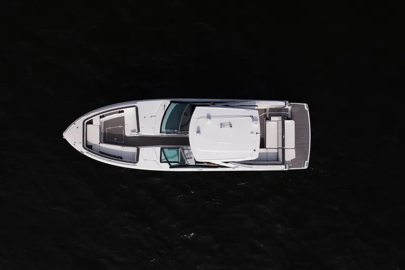 Slide: The Image of Overhead view of 2023 Monterey 378SS Super Sport boat on dark water. - 31