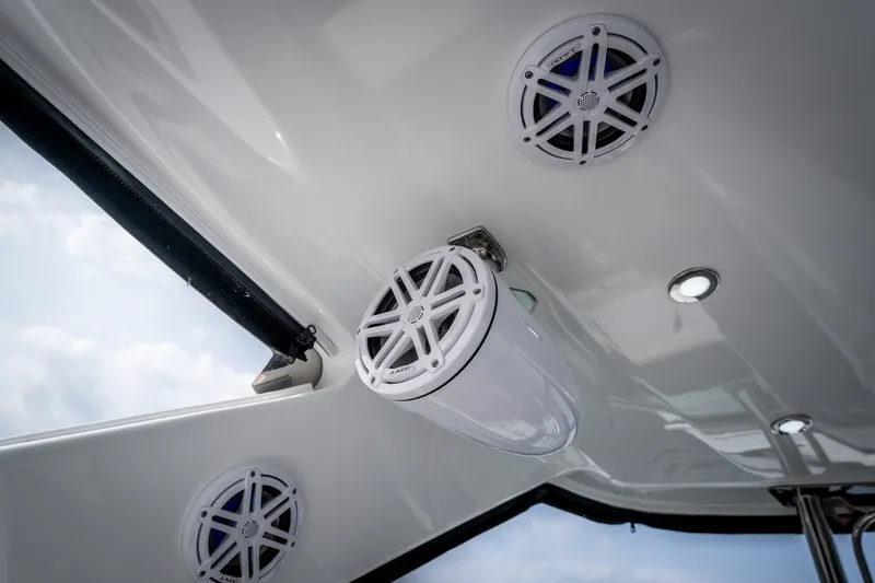 Slide: The Image of 2023 Monterey 378SS Super Sport boat speakers and lighting on deck ceiling. - 35