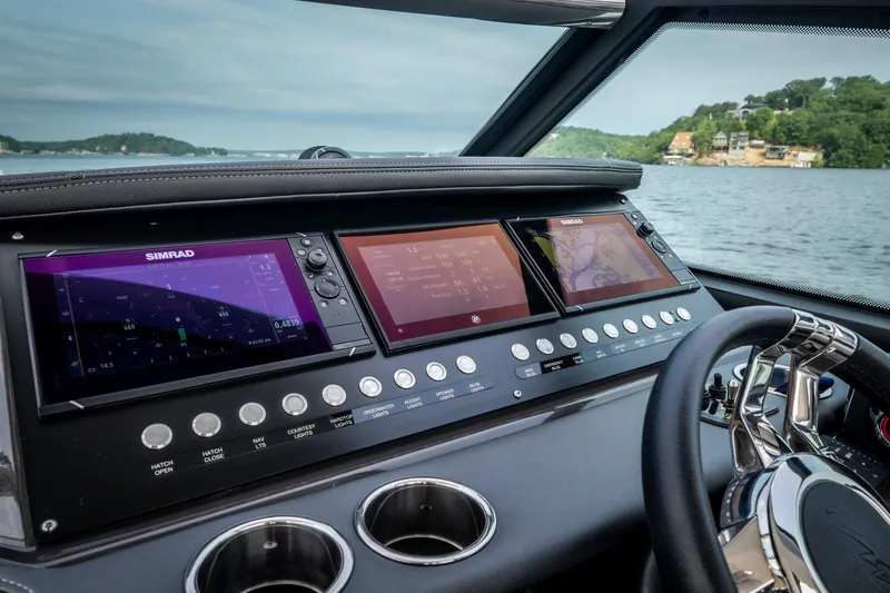 Slide: The Image of Dashboard of 2023 Monterey 378SS Super Sport boat with advanced navigation displays. - 15