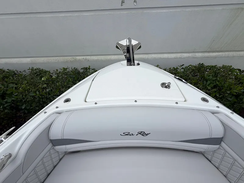 Slide: The Image of The 2027 Sea Ray SLX 280 Outboard features sleek white upholstery and a modern design. - 27