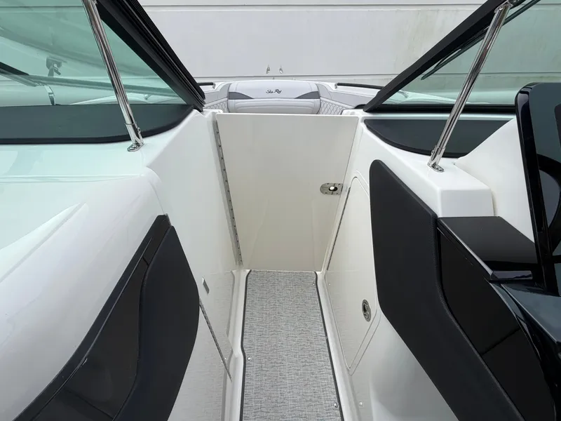 Slide: The Image of The 2027 Sea Ray SLX 280 Outboard features a sleek, modern interior with white and black accents. - 25