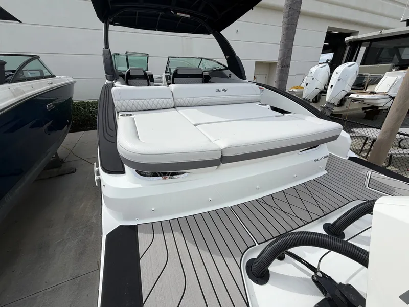 Slide: The Image of The image shows the rear of a 2027 Sea Ray SLX 280 Outboard with sleek seating and modern design. - 5