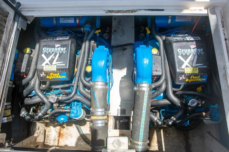 Slide: The Image of Engine compartment of 1996 CRUISERS YACHTS 3580 Flybridge with Crusader XL engines. - 11