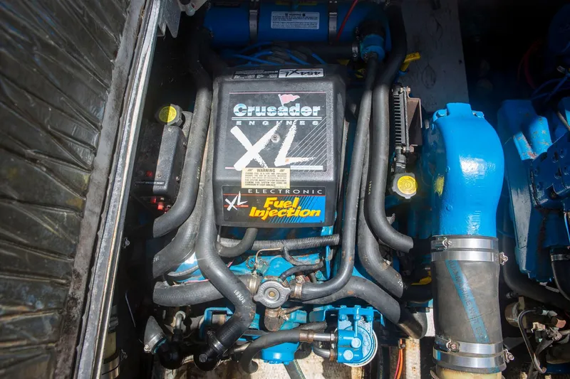 Slide: The Image of Engine compartment of 1996 Cruisers Yachts 3580 Flybridge with Crusader XL fuel injection system. - 58