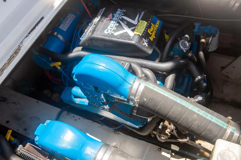 Slide: The Image of Engine compartment of a 1996 CRUISERS YACHTS 3580 Flybridge, featuring a Crusader XL engine. - 7