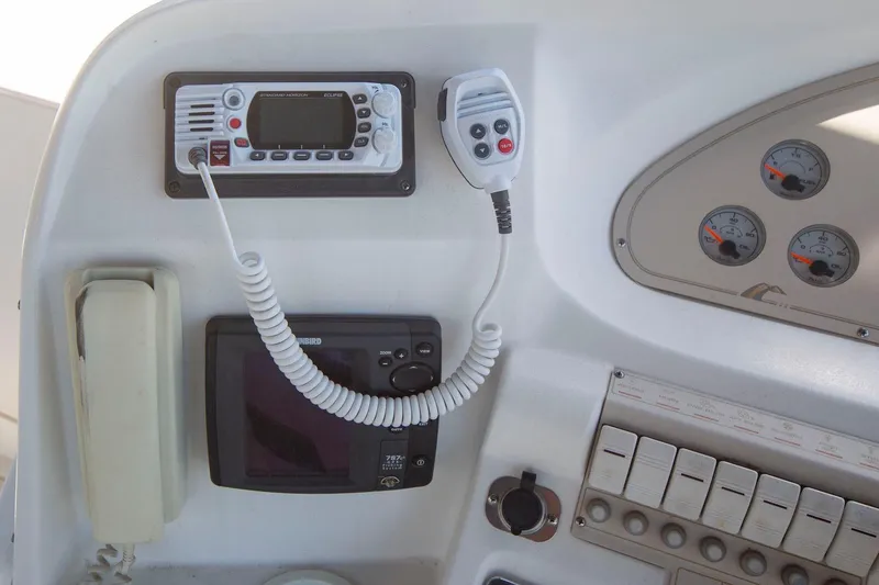 Slide: The Image of Control panel of a 1996 CRUISERS YACHTS 3580 Flybridge with radio and gauges. - 40