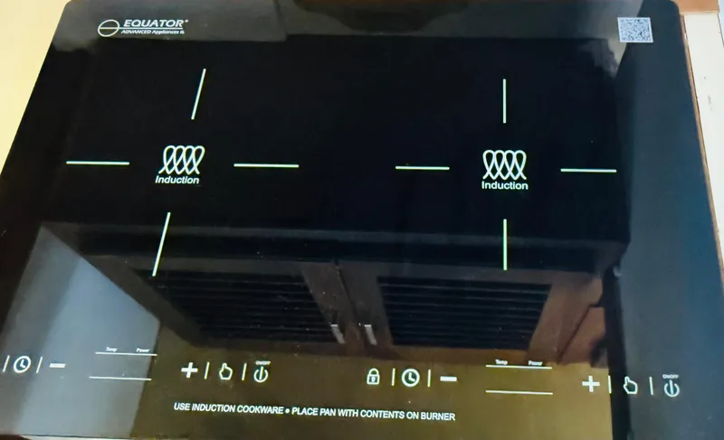 Slide: The Image of Induction cooktop with digital controls on a Silverton 402 Motor Yacht, 1983 model. - 15