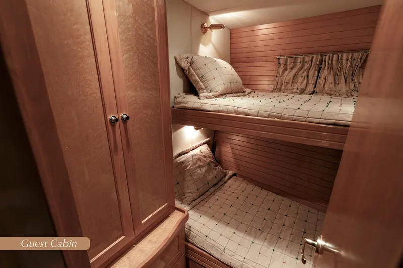 Slide: The Image of Guest cabin with bunk beds in 2004 McKinna 57 Pilothouse yacht. - 42