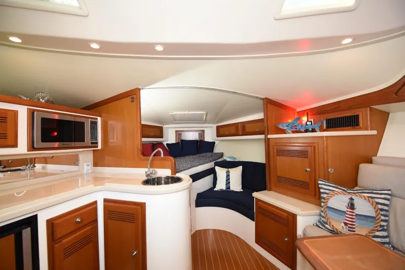 Slide: The Image of Luxurious interior of a 2002 Cabo 35 Express yacht with modern amenities. - 69