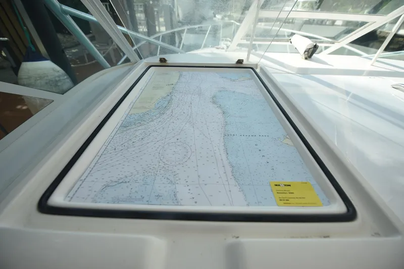 Slide: The Image of Nautical chart on 2002 Cabo 35 Express boat dashboard, showcasing navigation details. - 98