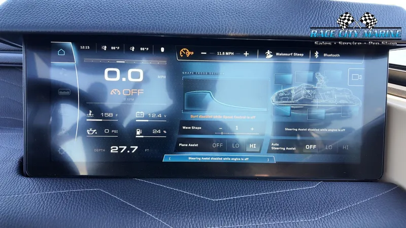 Slide: The Image of The image shows a digital dashboard with various displays and controls for a boat. - 35