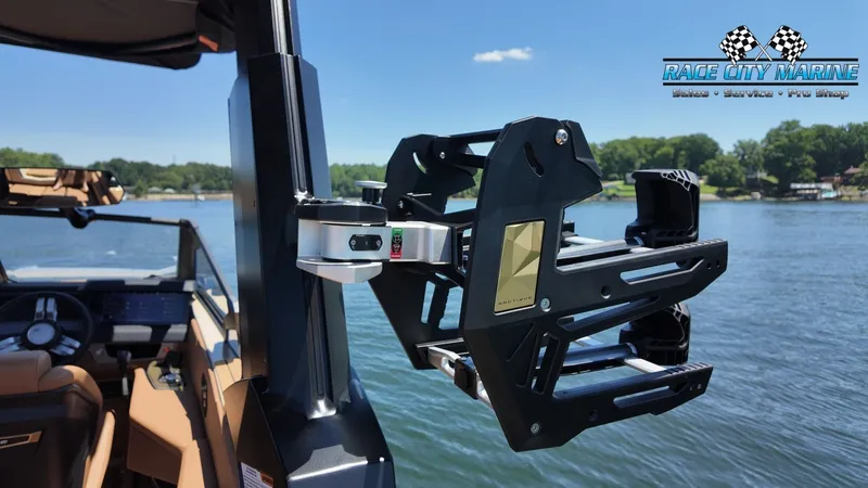 Slide: The Image of A modern boat with sleek design on a calm lake. The sky is clear. - 34