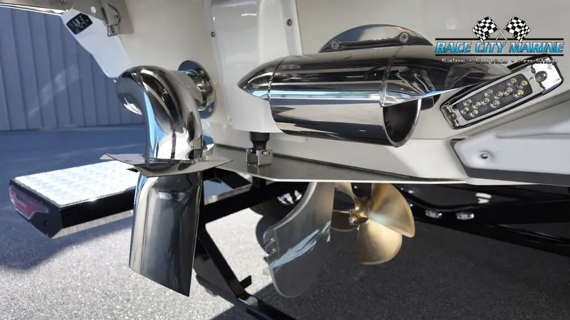 Slide: The Image of Close-up of the drive and propellers of a 2027 Nautique G25 boat. - 11