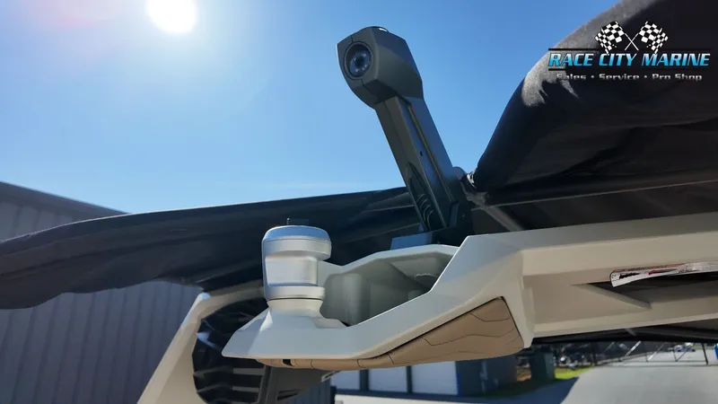 Slide: The Image of Close-up of a boat detail with a camera and mount. A building is visible in the background. - 15