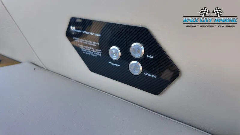 Slide: The Image of Close-up of a control panel with three buttons: Power, Up, and Down. - 46