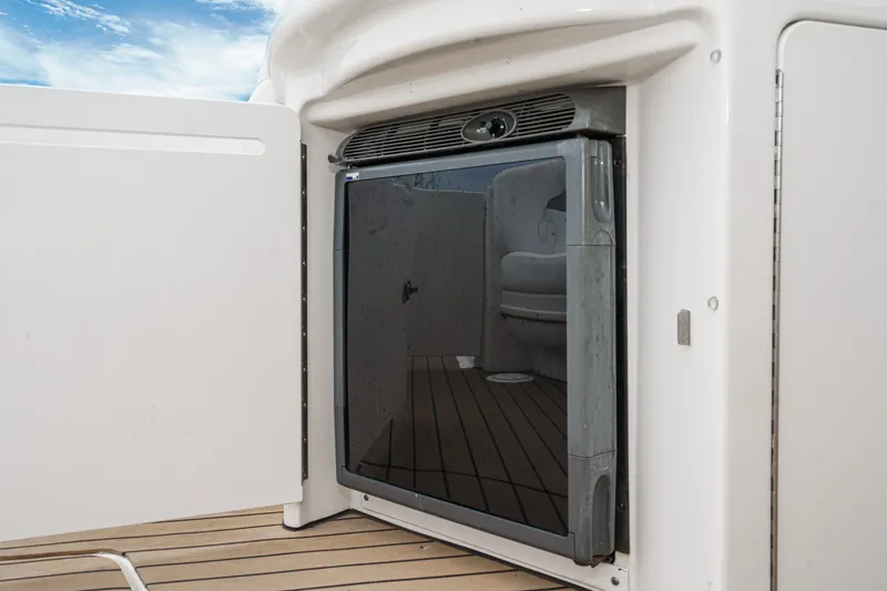 Slide: The Image of A refrigerator is integrated into the deck of a 2006 Sea Ray 340 Sundancer. - 13