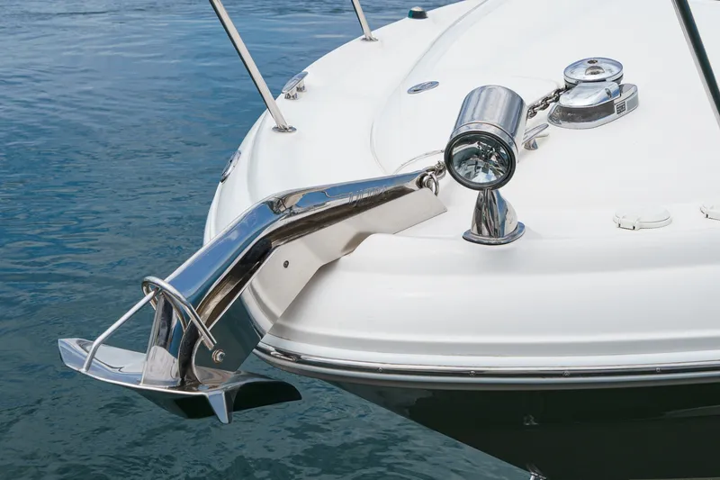 Slide: The Image of The bow of a 2006 Sea Ray 340 Sundancer with anchor and spotlight. - 7
