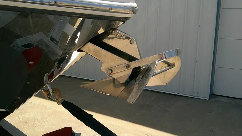 Slide: The Image of A shiny anchor is attached to the front of a 2020 Regal 2800 Bowrider. - 6