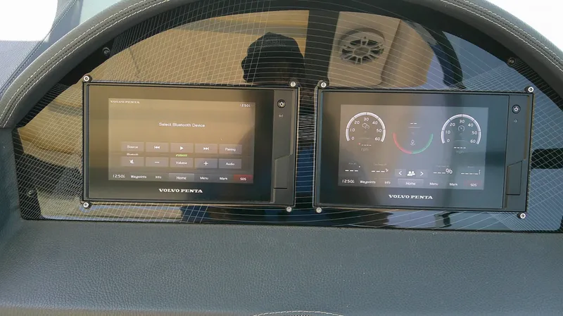 Slide: The Image of The image shows the dashboard of a Regal 2800 Bowrider with two digital displays. - 11