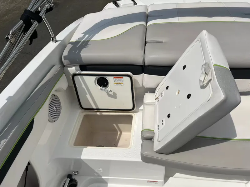 Slide: The Image of The image shows the cockpit of a 2018 Tracker TAHOE 700 MOK with gray upholstery. - 6