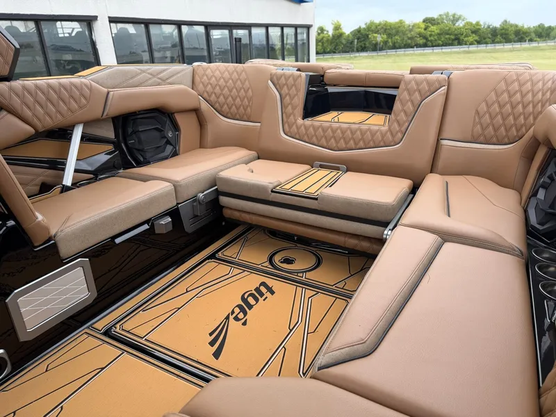Slide: The Image of Luxurious interior of a Tigé 24RZX boat with cushioned seating and elegant detailing. - 16