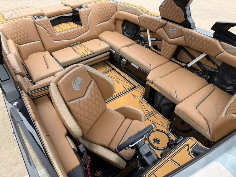 Slide: The Image of Luxurious interior of a Tigé 24RZX boat with elegant, upholstered seating and modern details. - 23