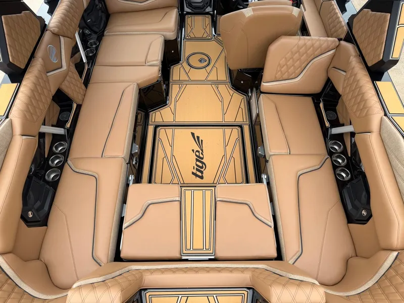 Slide: The Image of Luxurious interior of a Tigé 24RZX boat with beige upholstery and stylish details. - 9