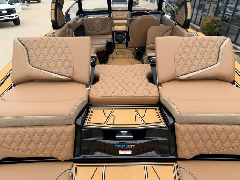 Slide: The Image of Luxurious interior of a Tigé 24RZX boat with elegant, upholstered seating and stylish design. - 7
