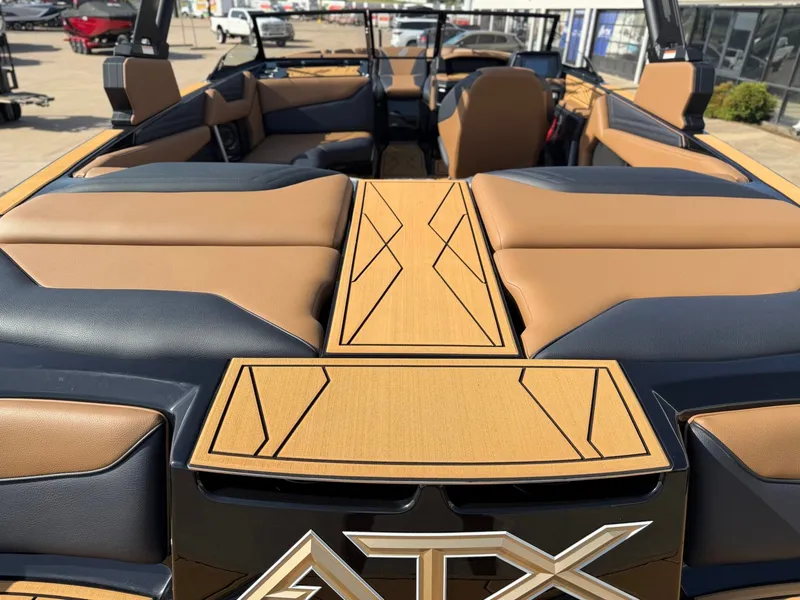 Slide: The Image of The image shows the interior of a 2027 ATX Surf Boats 22 Type-S with sleek seating. - 6
