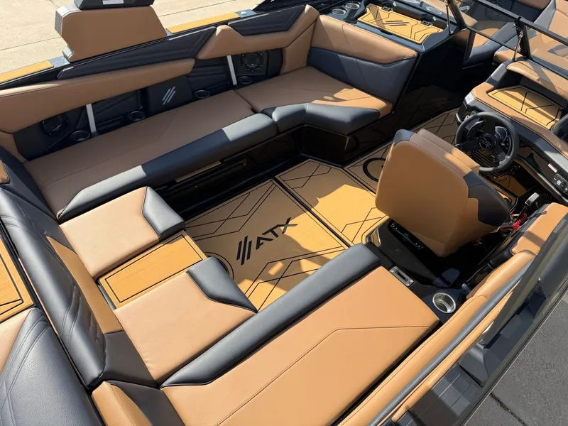 Slide: The Image of The image shows the luxurious interior of a 2027 ATX Surf Boats 22 Type-S with sleek seating. - 9