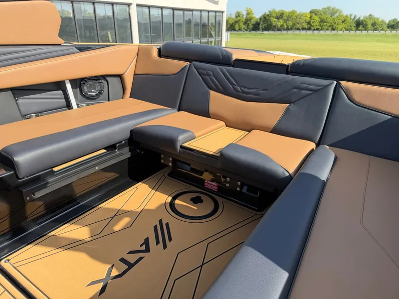 Slide: The Image of The image shows the luxurious interior of an ATX Surf Boats 22 Type-S with sleek seating and modern details. - 14